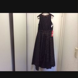 Very elegant Brand new special occasion dress. Size 14. Black and Bronze https://offerup.com/redirect/?o=Y29sb3IueW91 will love it for