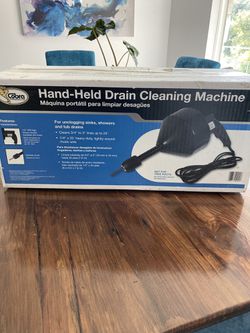 New. Motorized Hand-Held Drain Cleaning Machine