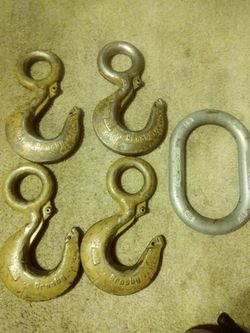 Four 15 ton Crosby hooks an one master ring 1-1/2 inch ring