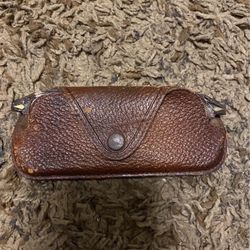 Old antique glasses case and glasses