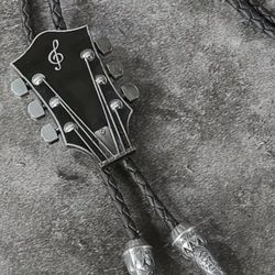 New black guitar country Western Bolo Tie 39" other colors available. Blue shown for measurements only. SHIPPING AVAILABLE 