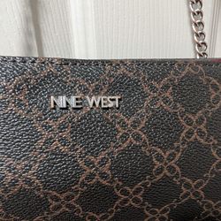 NINE WEST PURSE WITH RED TRIM 