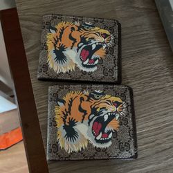 Two Gucci Wallets 