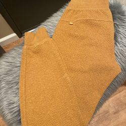 Lululemon Women’s Warm Down Mid Rise Jogger. Size 2