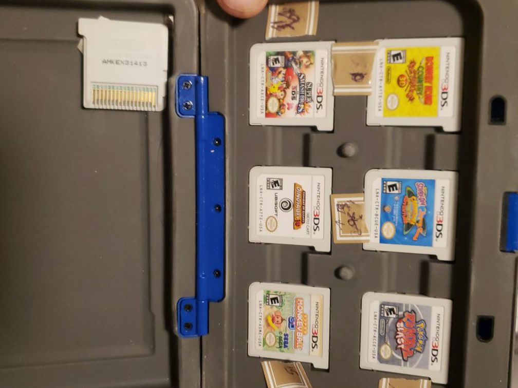 NINTENDO 3DS GAMES and Holding Box For 6 Games. However I Have 7 Games. Barely Used