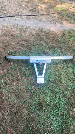 Quick click ladder stabilizer
