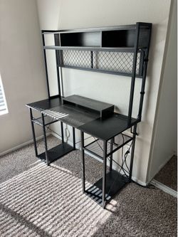 Used black and grey desk