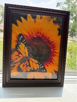 Diamond dot painting of a sunflower