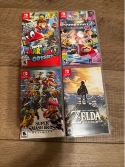 4 Switch games (Super Mario Odyssey, Mario Kart 8, Super Smash Bros Ultimate and Zelda Breath of the Wild)