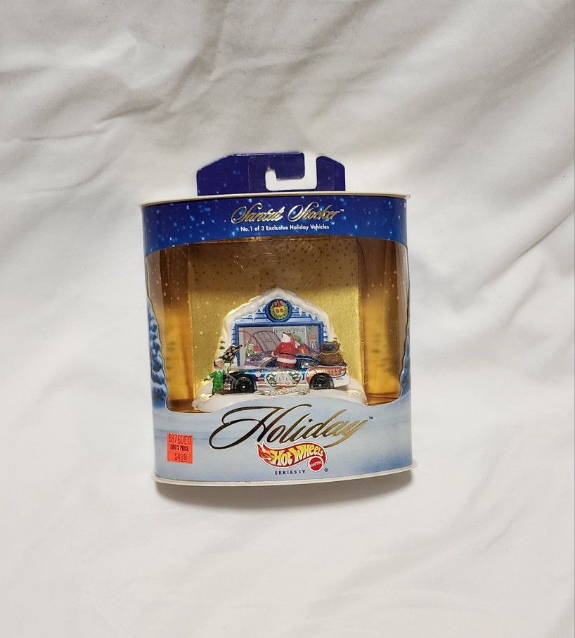 Hot Wheels “Holiday Series IV – Santa’s Stocker”