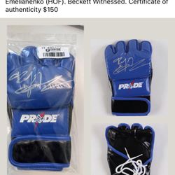 Pride UFC glove has been hand-signed by Fedor Emelianenko (HOF). Beckett Witnessed. Certificate of authenticity $150