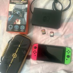 NINTENDO. SWITCH    2 GAMES.  DOCK. 
