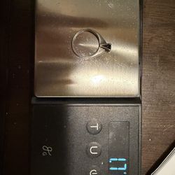 18K white gold ring with purple diamond