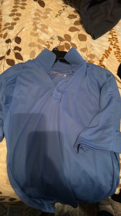 Ariat branded shirts and collars.