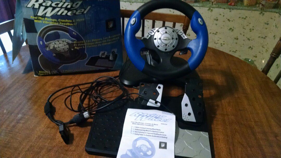 PlayStation 2 steering wheel and pedals