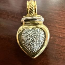 David Yurman 14 karat gold pendant with natural diamonds and stainless silver