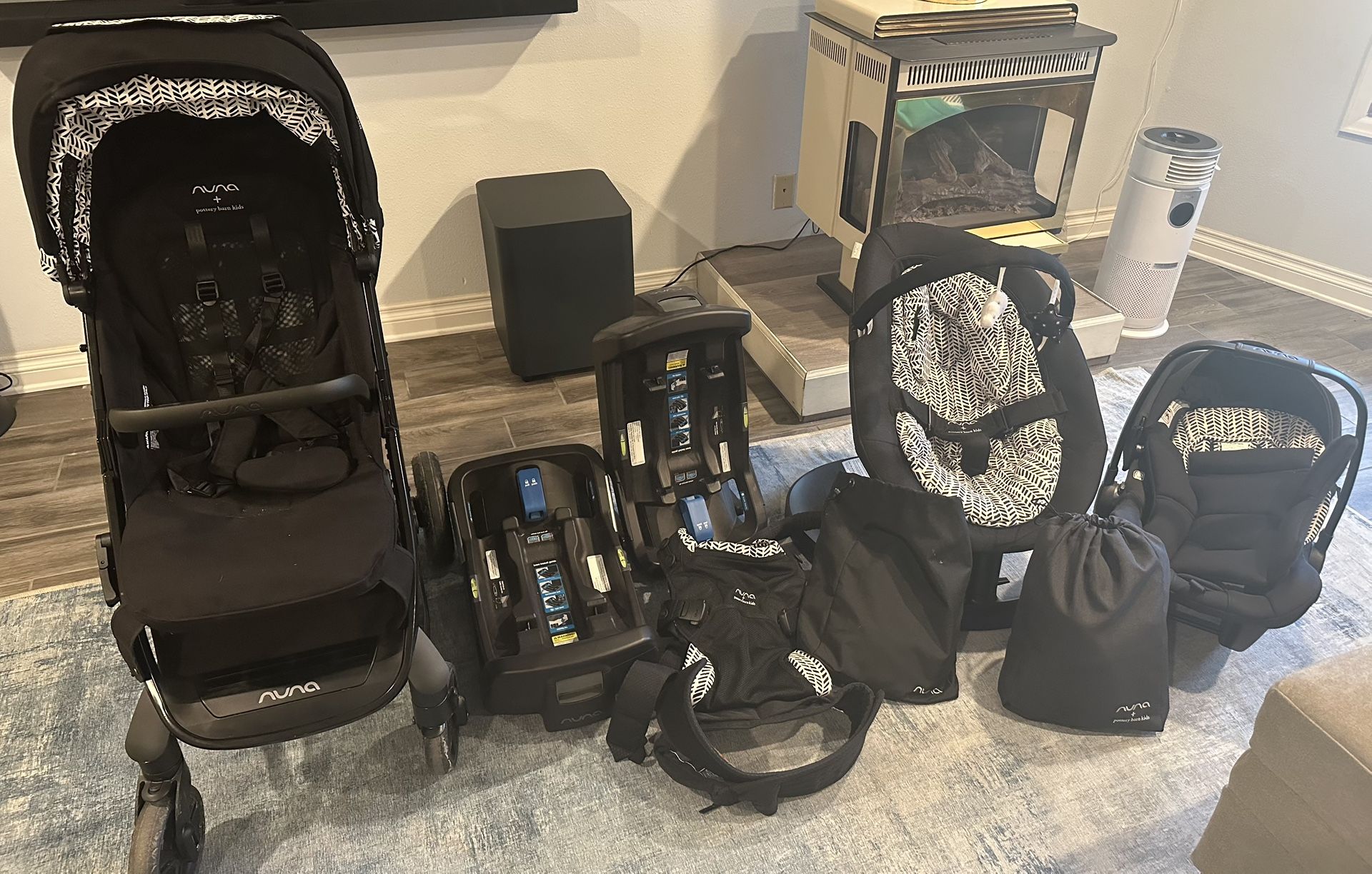 Nuna Stroller, Car Seat, 2 Bases For Car Seat, Baby Swing, And Matching Baby Carrier