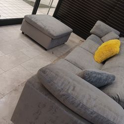 *Living Room Special*---Lima Floating Gray Fabric Sectional Sofa W/Ottoman---Now $799---Delivery And Financing👏