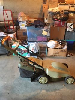 Cordless lawnmower neutron brand. Needs new battery