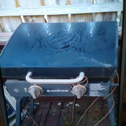 TWO BLACKSTONE GRILLS AND FULL SIZE TANK