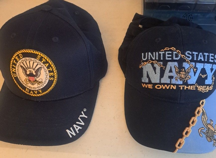 two dark blue Navy Baseb Caps