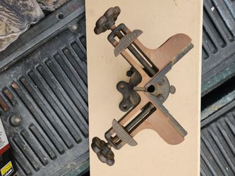 Cast iron pitcher frame implement