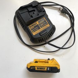 Dewalt 20v  battery 2amp and charger in Good Working Condition $40 Cash In Ontario 91762. 20 volt 