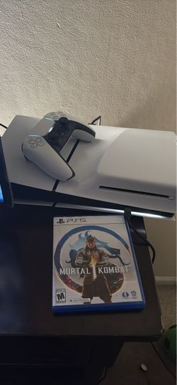 PS5 Console with Controller and Mortal Kombat 1