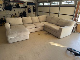 Living Spaces Beige Sectional Sofa with Chaise