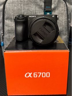 Sony A6700 camera and 50mm lens.