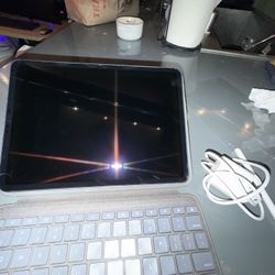 Ipad With The Case And A Charger