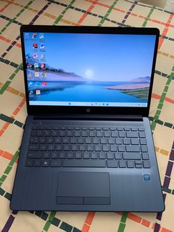14"inch Intel Celeron HP Laptop, 4GB RAM, 64GB eMMC, HDMI, Type C Port, Inbuilt Bluetooth, SD Card Reader And a WebCam. Windows 11 Installed.