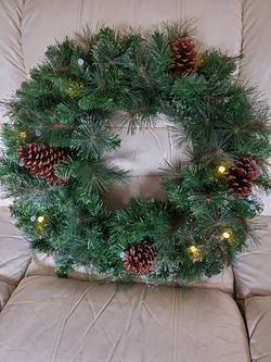 large prelit wreath , twinkle or steady