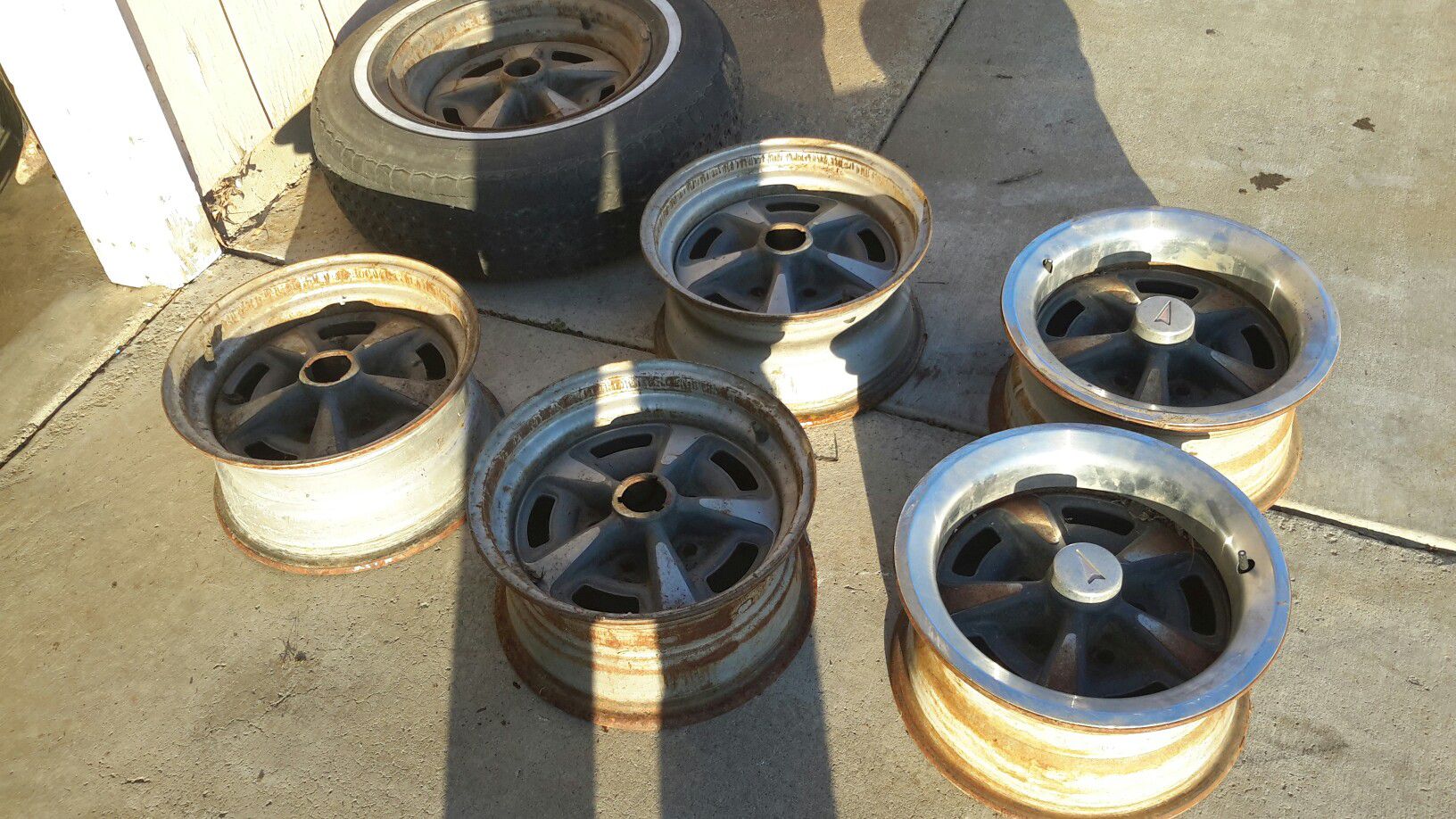 PONTIAC GTO LEMANS RALLY WHEELS 14 INCH STOCK OEM ONE IS A 15 INCH ALL FOR SALE