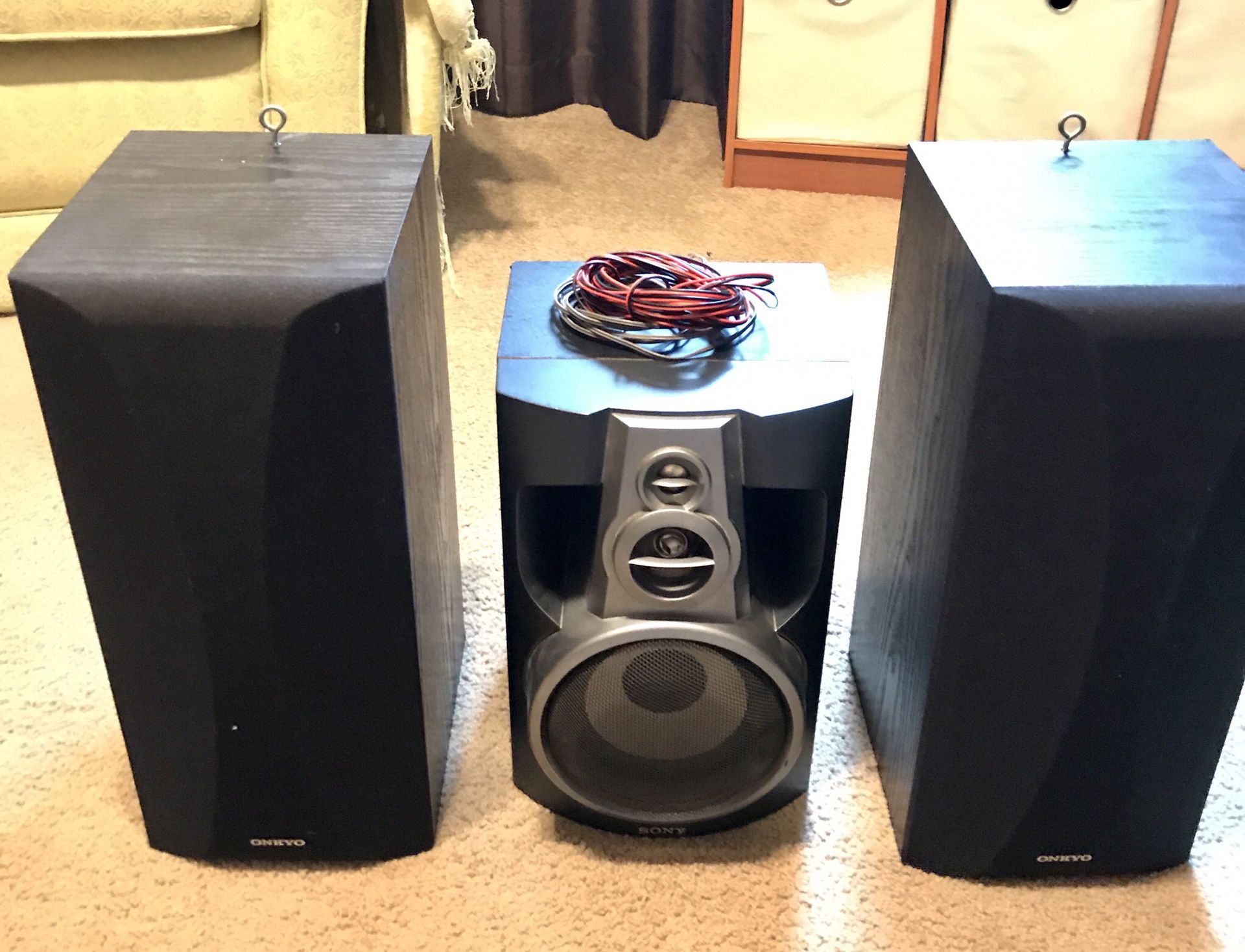 2 Onkyo speakers and a center speaker with speaker wire!