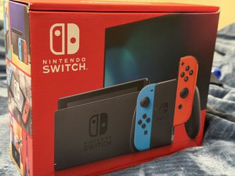 Nintendo Switch With Neon Blue Neoleon Red Joy