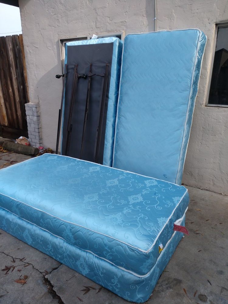 Two twin beds with frame,x condition...