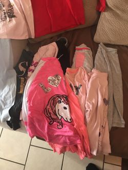 Girls shirts size 10-12 14-16