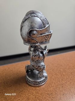 Miniature bobble head knight