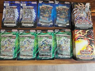 14 Yugioh booster packs & 2 starter decks