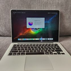 2015 13.3 Retina Apple MacBook Pro. 3.1ghz i7 16gb Ram 500gb Ssd