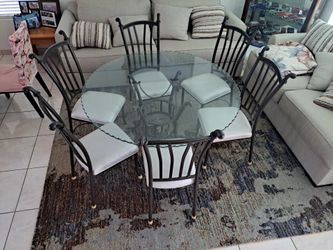 54" glass table with 6 chairs