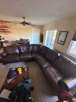 Leather Sectional Couch – Used (9’ x 9’)