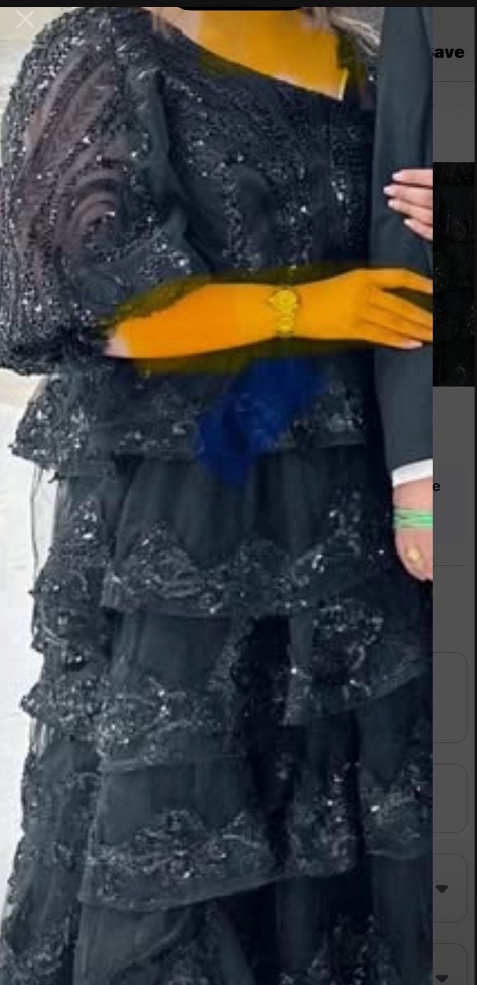 Long, black, party dress with sequins and black net around it beautiful party dress