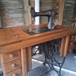 Vintage Treadle Sewing Machine Branded "New Autamatic"mounted In Wooden Cabinet Cast Iron Base