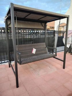 New.  Agio Menlo Woven Patio Swing.