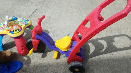 Fisher price push/rocker trike