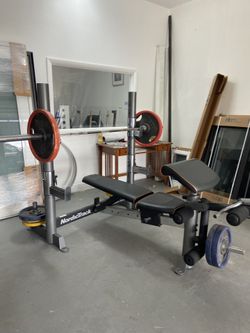 Bench with Barbell And Weight