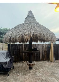 Thatched tiki bar table