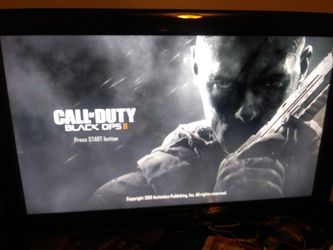 Ps3 with one controller and cables and 16 games